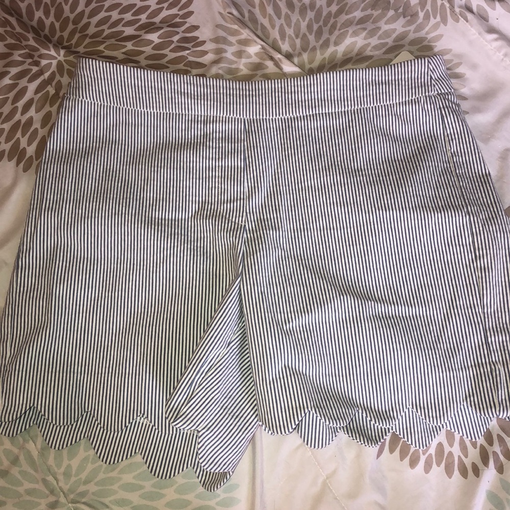Scalloped blue and white striped shorts
